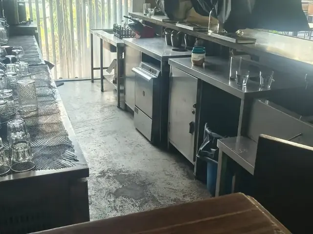 Bar counter, glassware and steel equipment