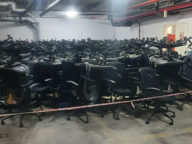 Hundreds of office chairs in bulk