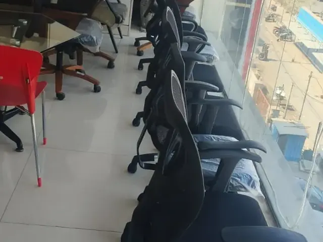 Office chairs lined up in an office