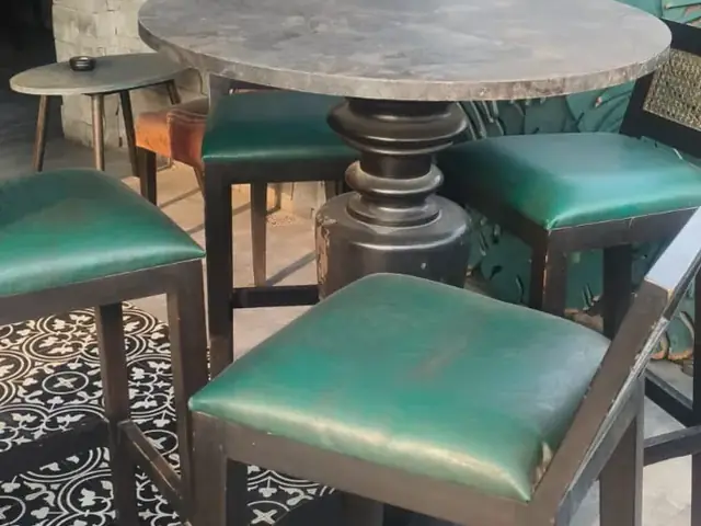 Restaurant bar table with high stools