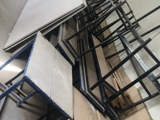 Steel-frame tables and benches from an office clearance
